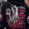 A STRONG WOMAN LOOKS DANGER SUGAR SKULL ALL OVER