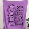 STUCK BETWEEN IDK IDC AND IDGAF SKULL BLANKET