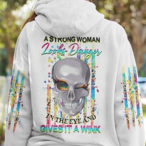 A STRONG WOMAN LOOKS DANGER ALL OVER PRINT